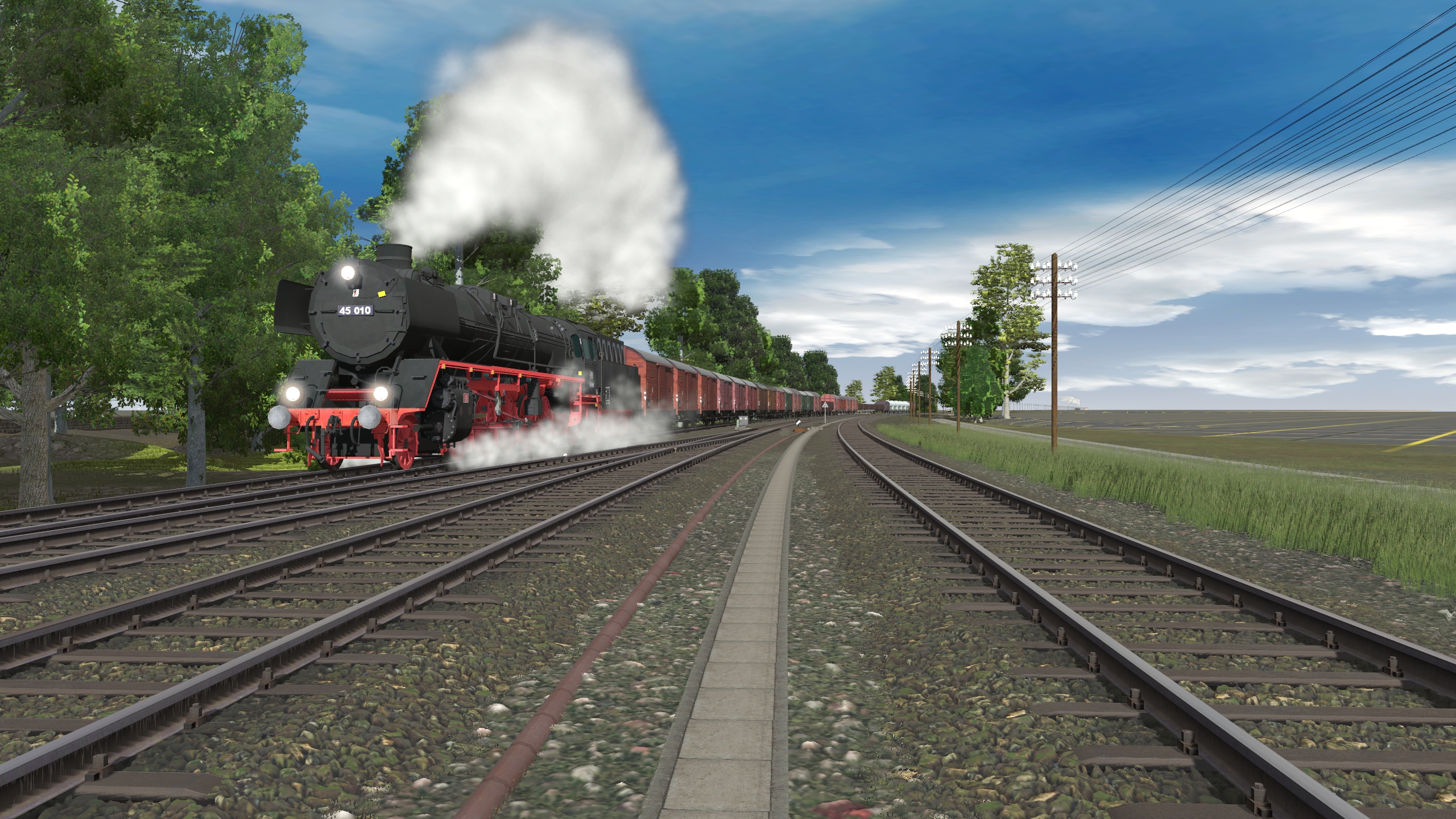 Br 45 hauling freight out of München passing junction no 4 inbound for track 6